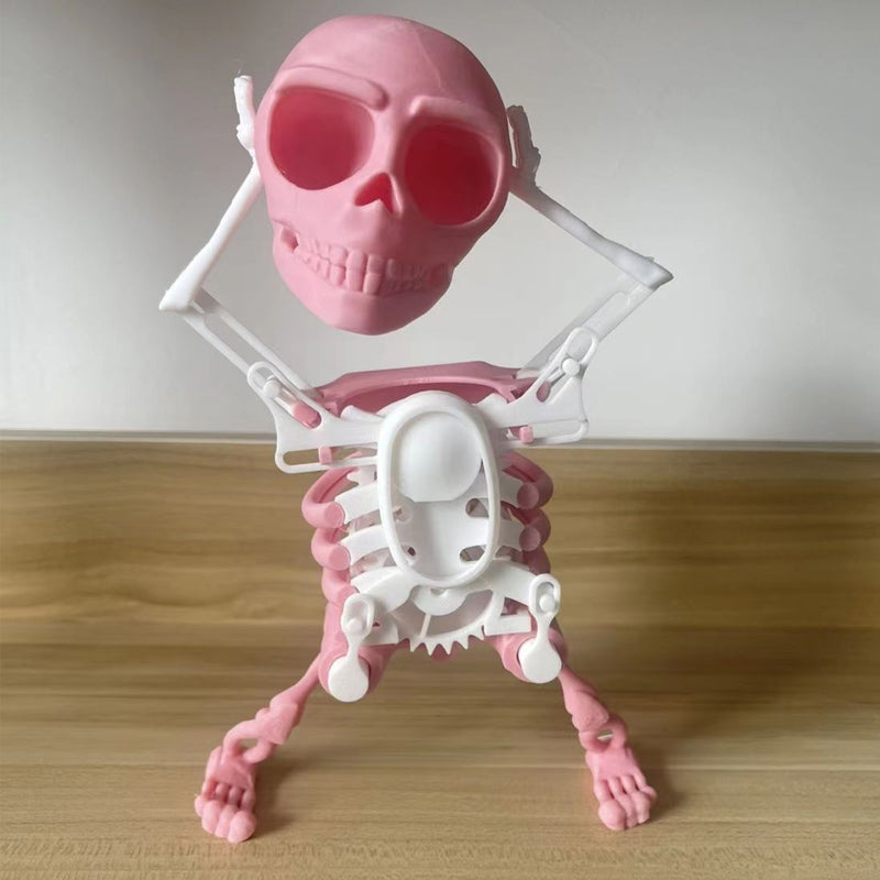 Dansende og svingende 3D-dødningehovedlegetøj