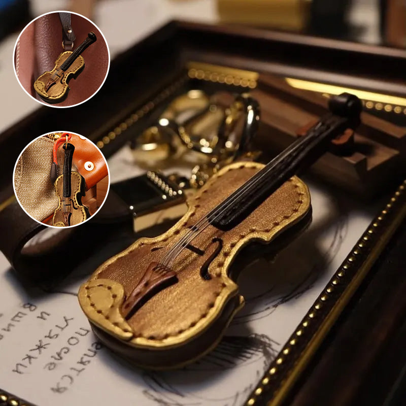Handgefertigter Schlüsselanhänger aus Leder mit Violine und Cello
