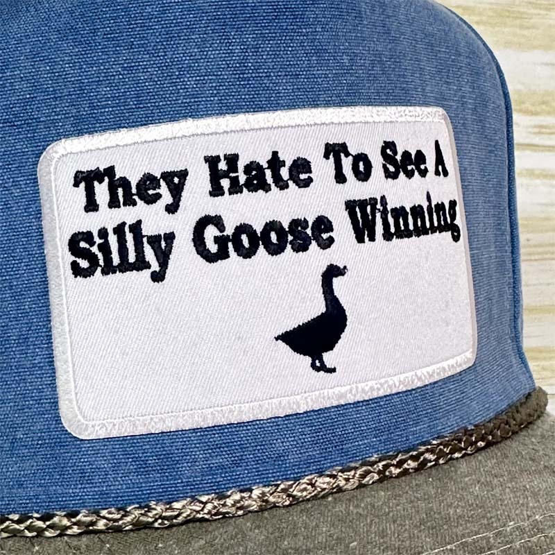 "Sie hassen es, eine dumme Gans gewinnen zu sehen" Hut