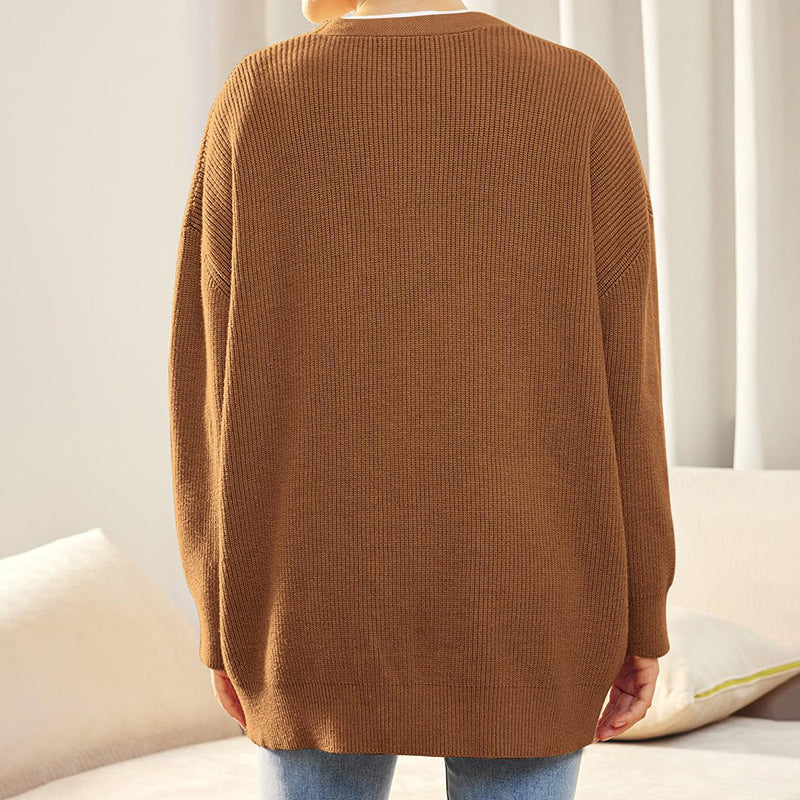 Einfarbiger Pullover mit geknöpftem V-Ausschnitt