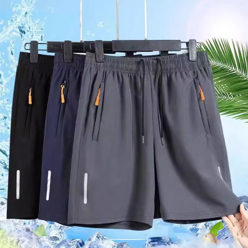 Locker sitzende Sportshorts mit Reißverschlusstaschen