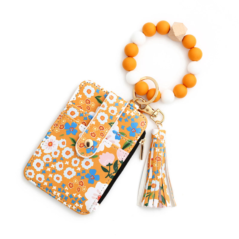 Florale Lederbrieftasche mit Schlüsselanhänger und Armband