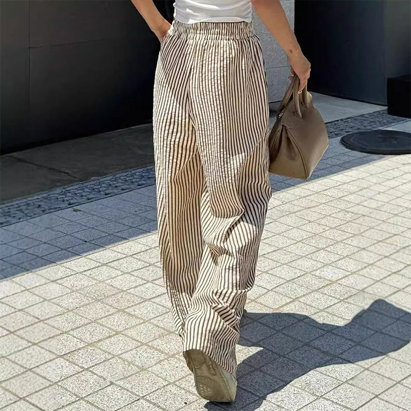 Lockere und vielseitige Hose mit hoher Taille und weitem Bein und elastischem Bund