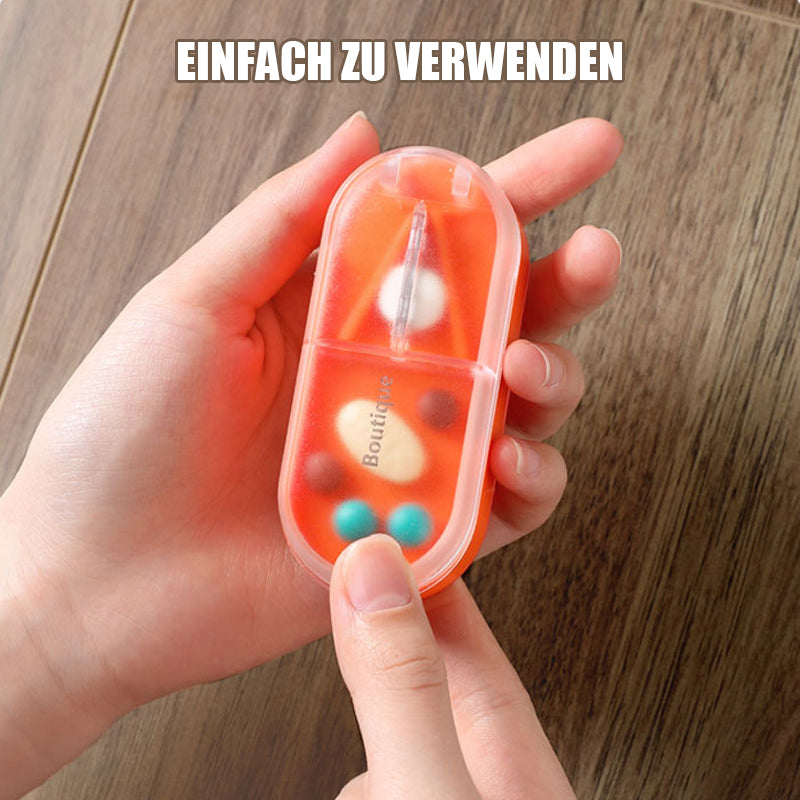 Pillendose mit Pillenschneider