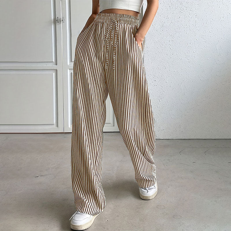 Lockere und vielseitige Hose mit hoher Taille und weitem Bein und elastischem Bund