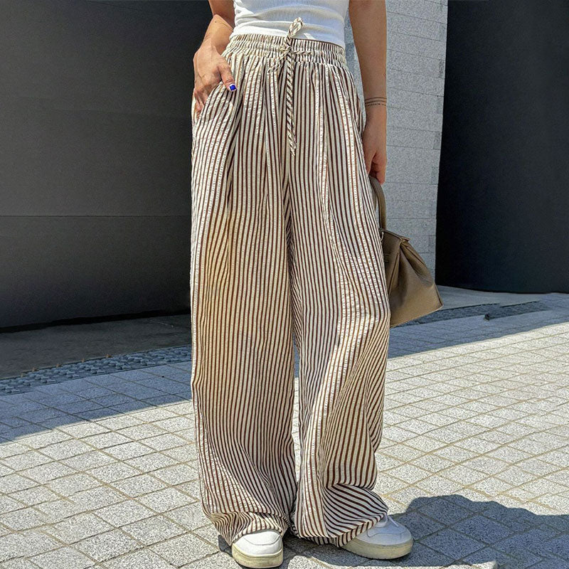 Lockere und vielseitige Hose mit hoher Taille und weitem Bein und elastischem Bund