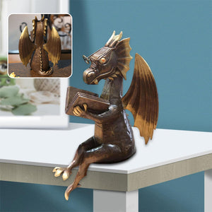 Dekorative Statue mit einem Drachen, der ein Buch liest