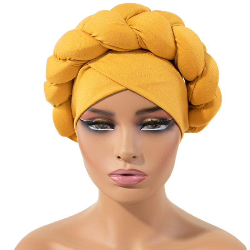 Schlichter Turbanhut aus Milchseide mit großem Zopfmuster