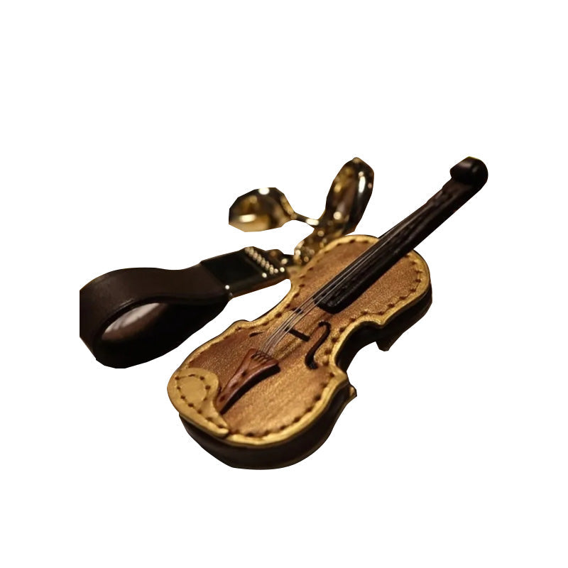 Handgefertigter Schlüsselanhänger aus Leder mit Violine und Cello
