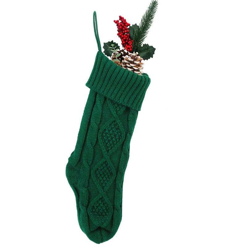 Weihnachtsstrümpfe – Der Weihnachtsmann legt Geschenke auf Socken