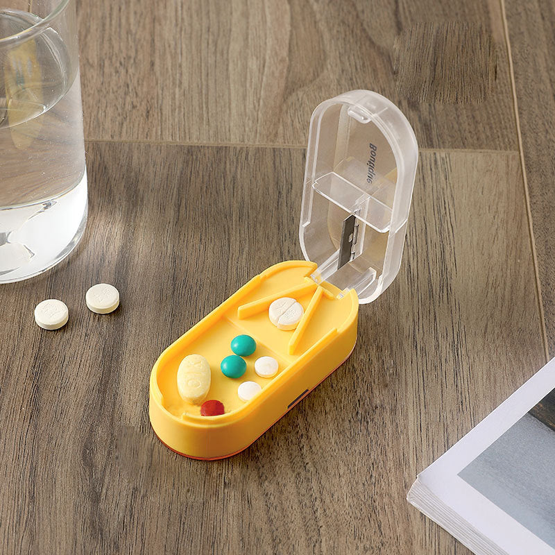 Pillendose mit Pillenschneider